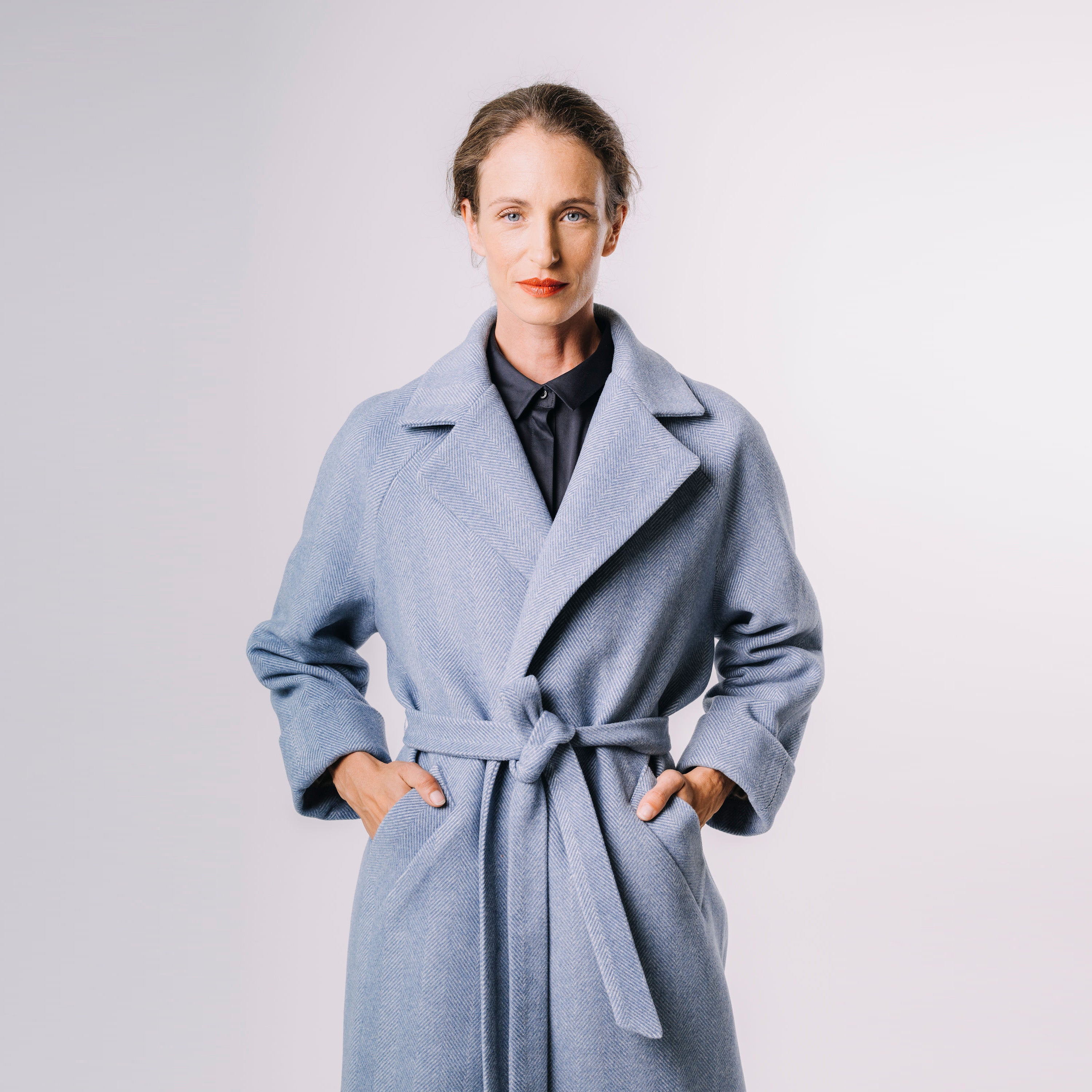 Kabát s raglánovým rukávem