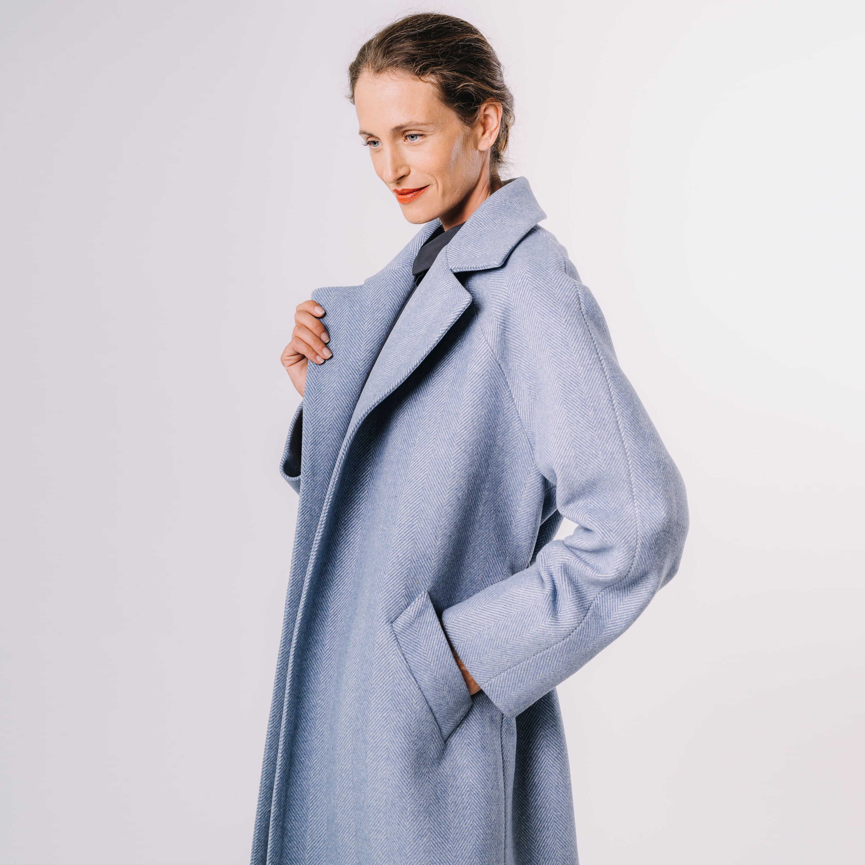 Kabát s raglánovým rukávem